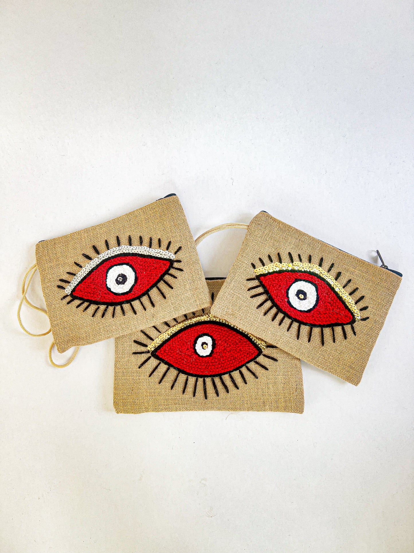 Burlap Red “Evil Eye” Wrist Bag