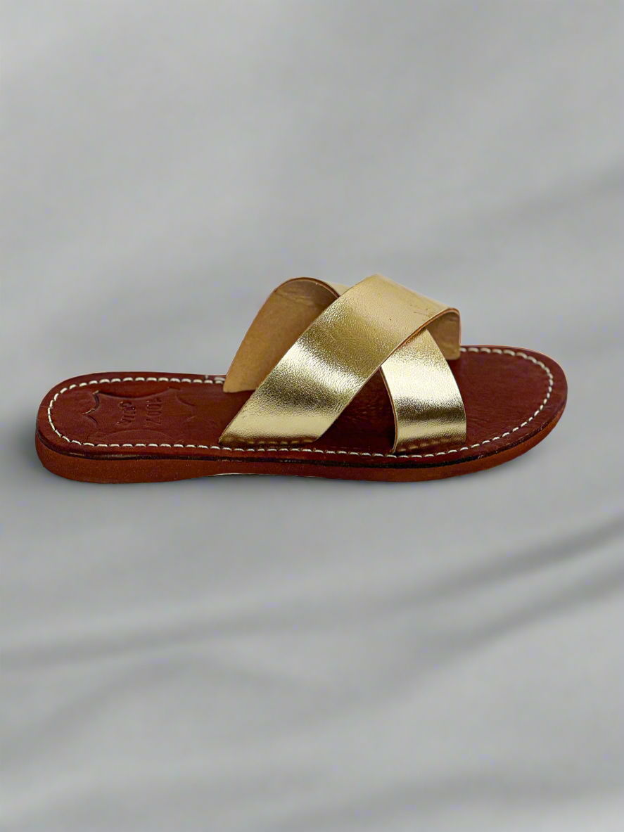 Authentic Idrissi & Burch Moroccan handmade gold leather sandals with decorative stitching.